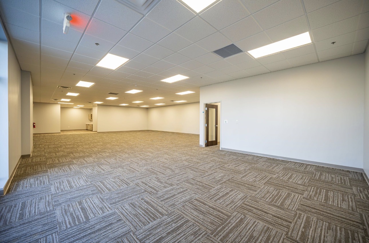Office suite corridor and open area after finishing