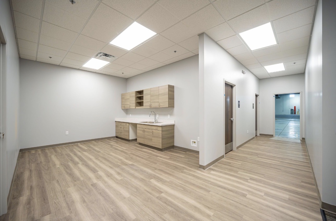 Office break area with finished walls, ceiling, and trim