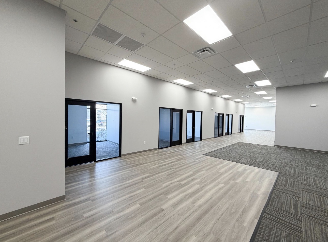 Run of glass-front private offices after finishing