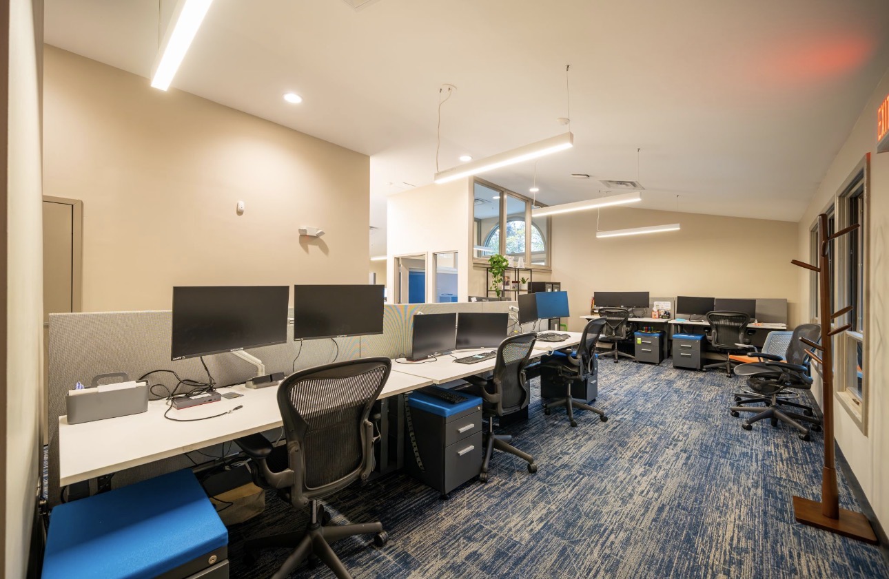 Open workstation bay with newly finished walls and ceilings
